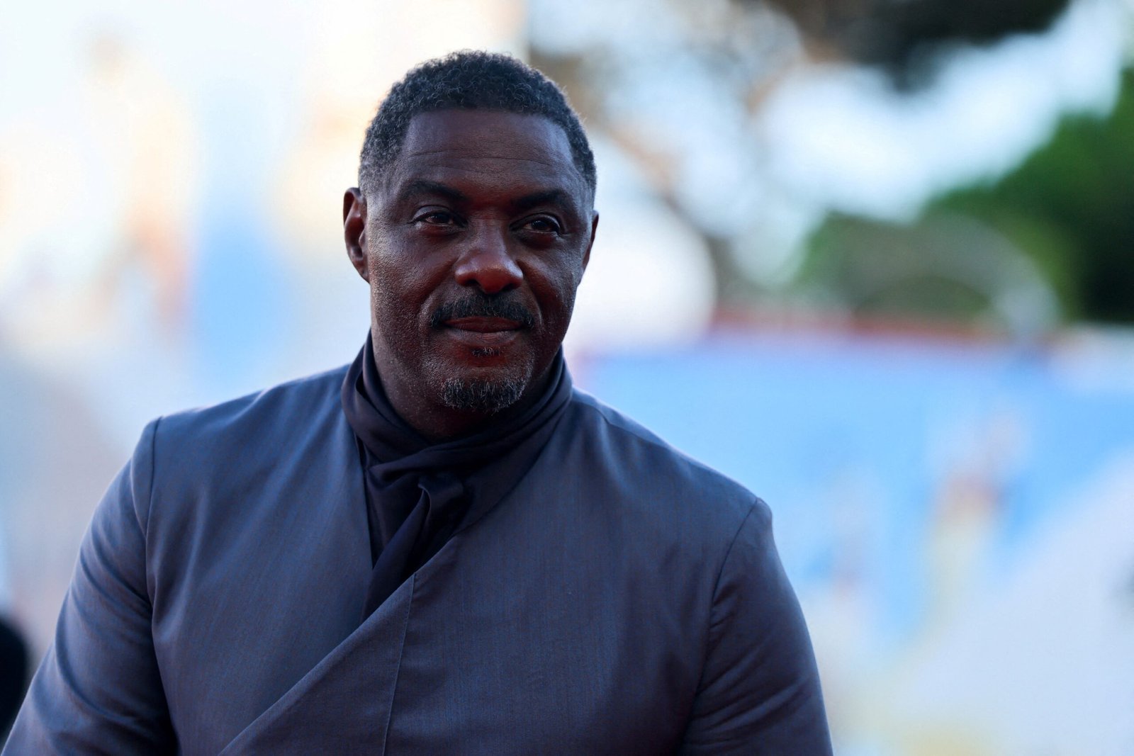 O ator Idris Elba, os patinadores artísticos Jayne