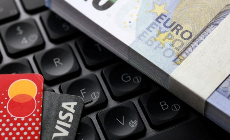 Ilustração mostra notas de euro e cartões Visa